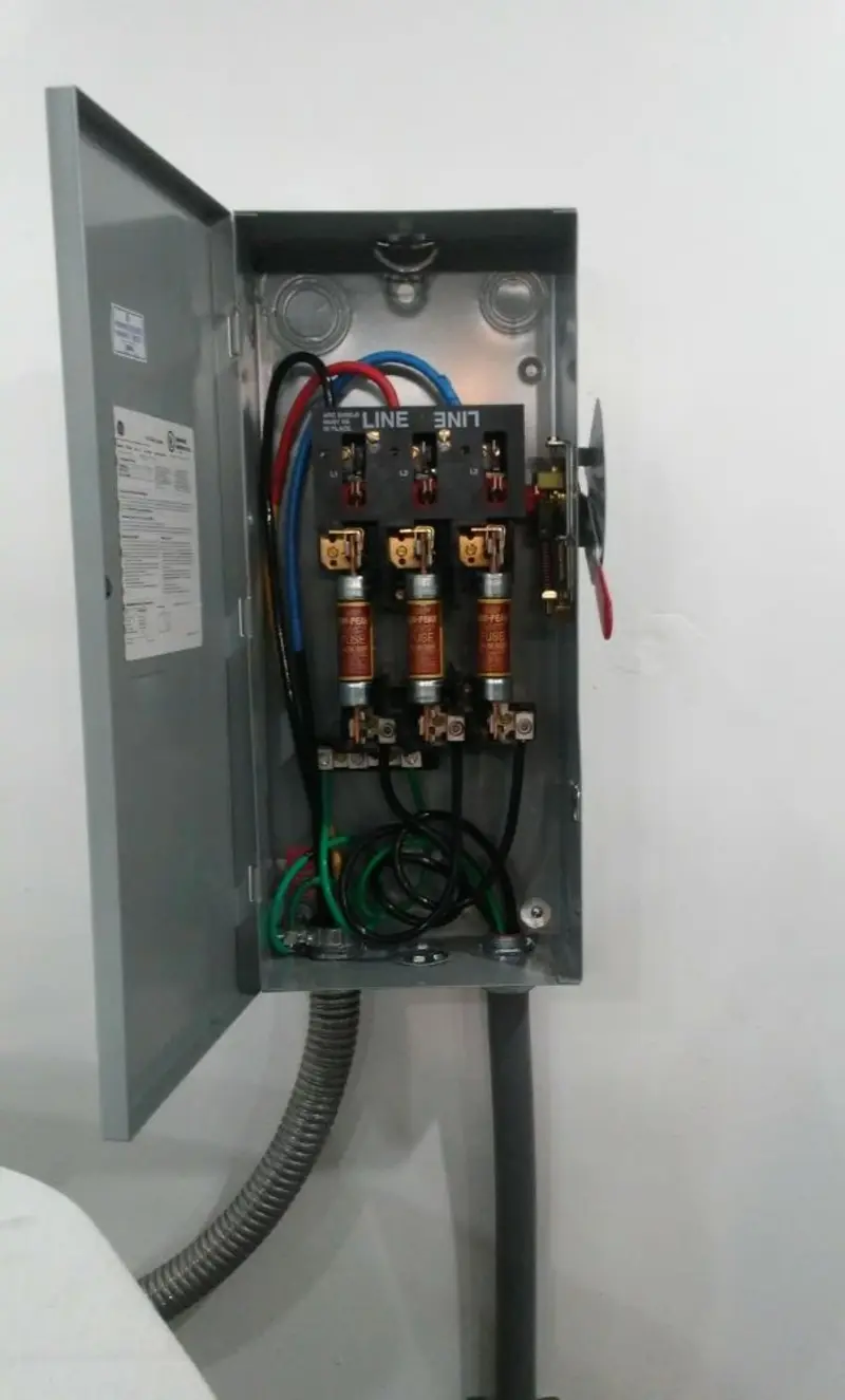 Three-phase disconnect switch installed for Smoke Detector Installation in Titusville