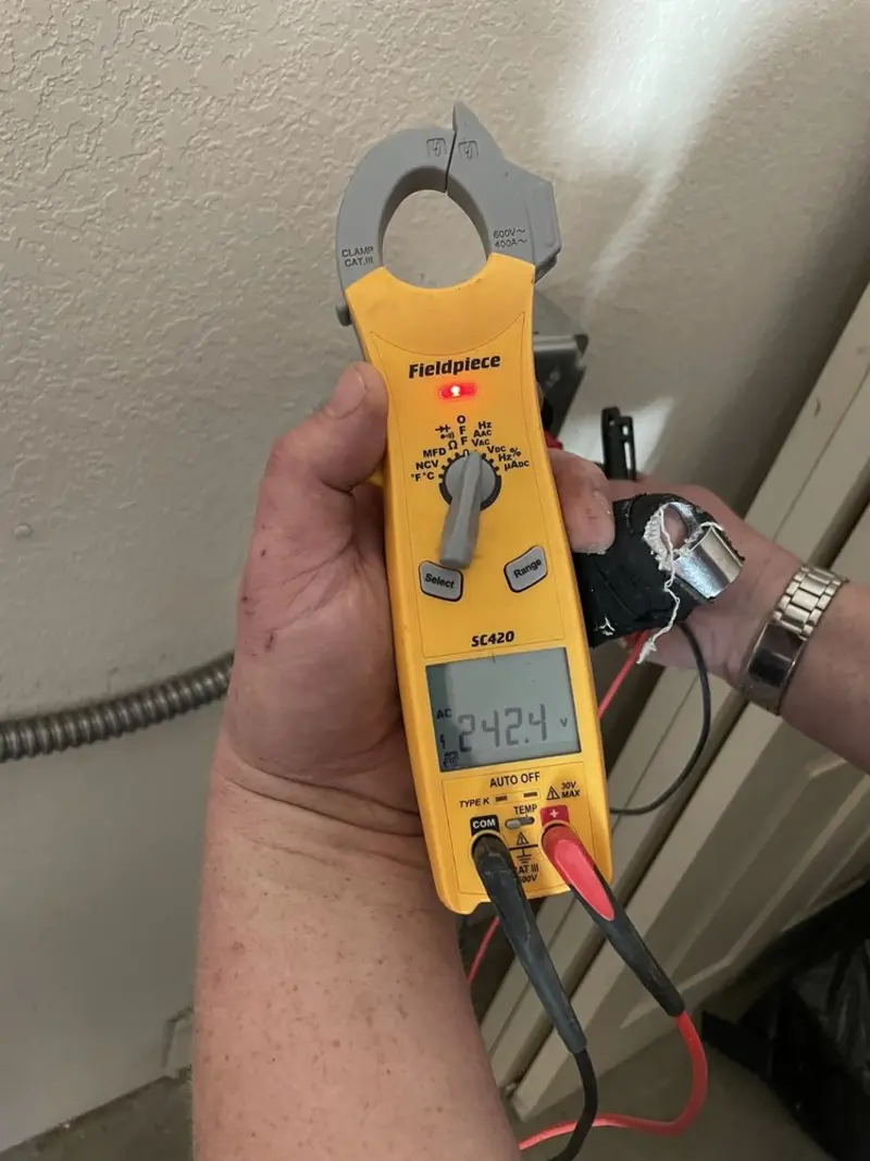 Voltage testing with clamp meter during Generator Installation in Titusville